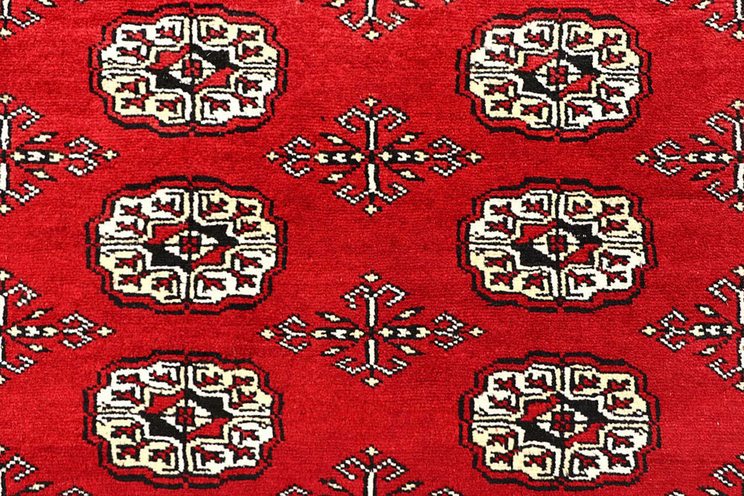 Red Pakistani Bokhara Rug 6' x 8'6" Hand-Knotted | No. QA66415