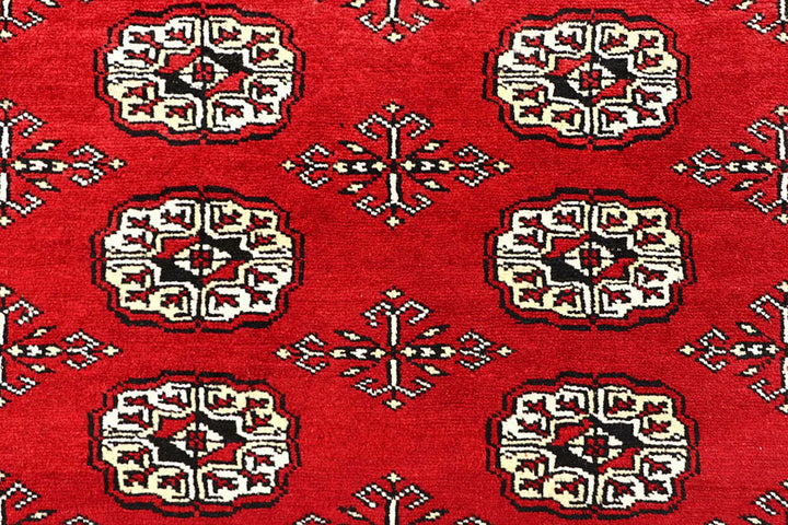 Red Pakistani Bokhara Rug 6' x 8'6" Hand-Knotted | No. QA66415