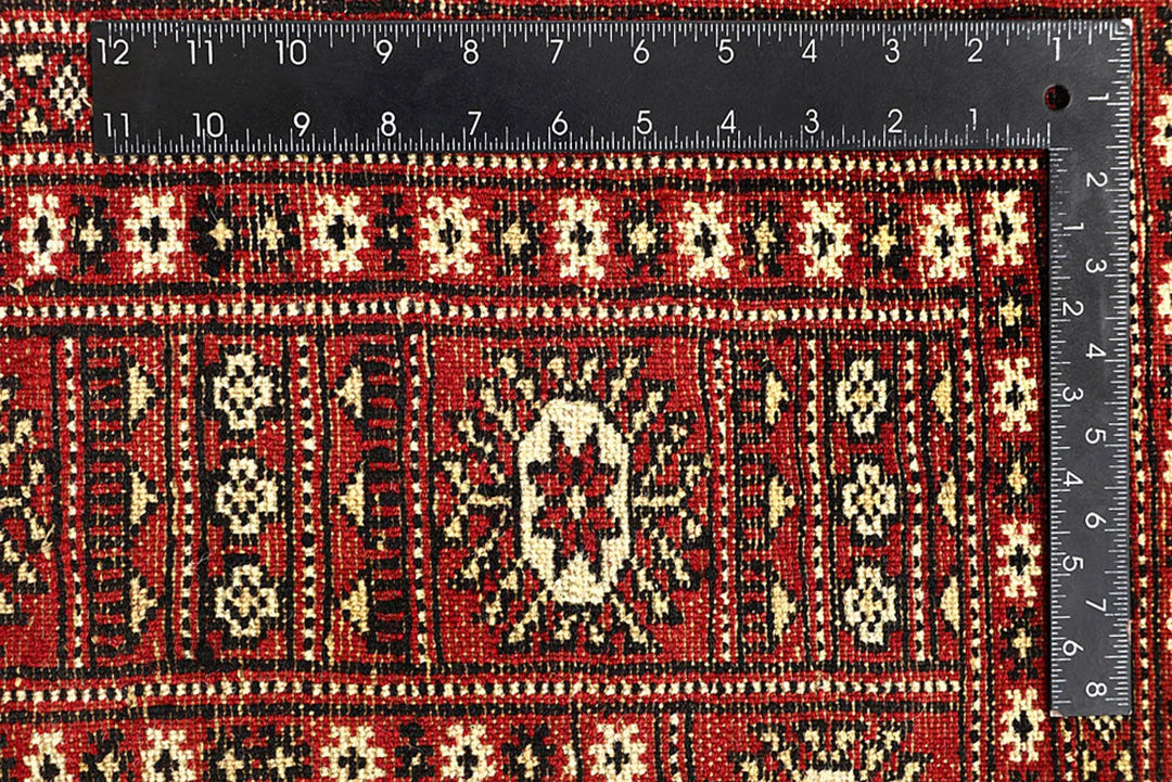 Red Pakistani Bokhara Rug 6' x 8'6" Hand-Knotted | No. QA66415