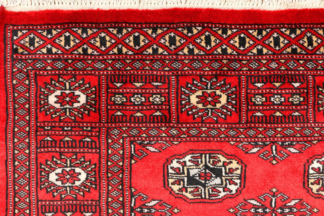 Red Pakistani Bokhara Rug 3' 1" x 5' 2" Hand-Knotted | No. QA66696
