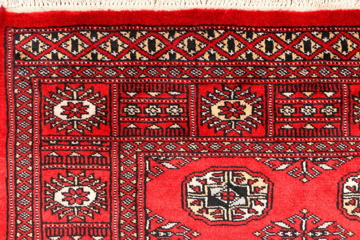 Red Pakistani Bokhara Rug 3' 1" x 5' 2" Hand-Knotted | No. QA66696