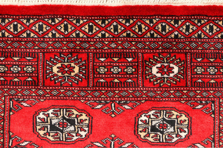 Red Pakistani Bokhara Rug 3' 1" x 5' 2" Hand-Knotted | No. QA66696