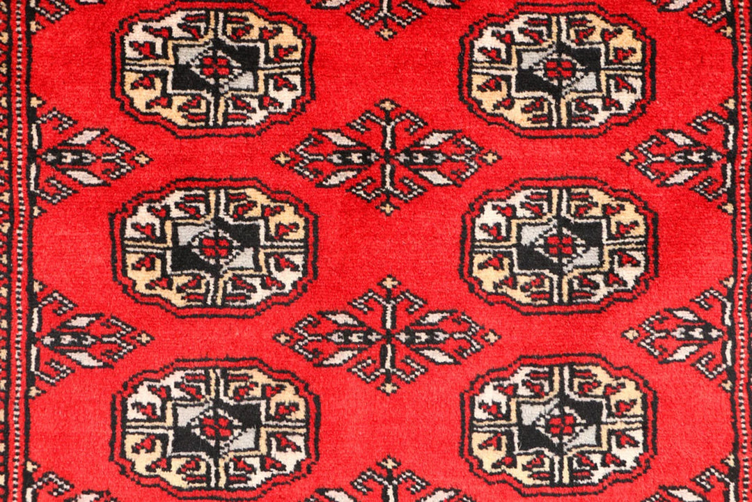 Red Pakistani Bokhara Rug 3' 1" x 5' 2" Hand-Knotted | No. QA66696
