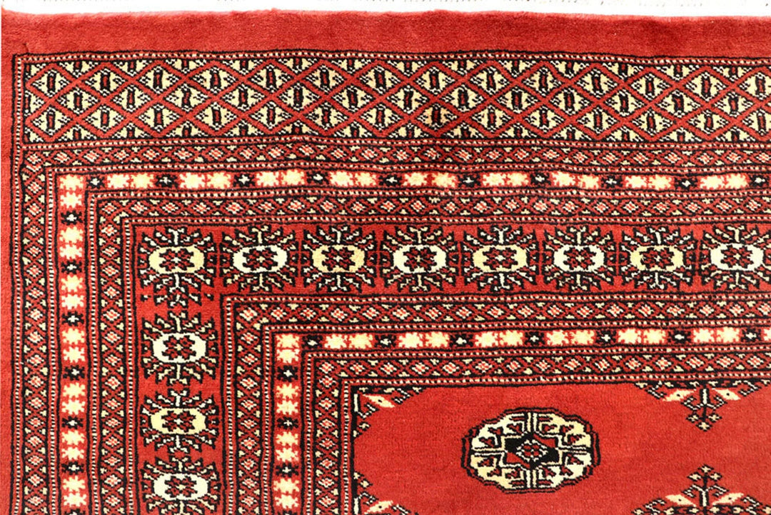Coral Pakistani Bokhara Rug 6' 2" x 8' 10" Hand-Knotted | No. QA66791