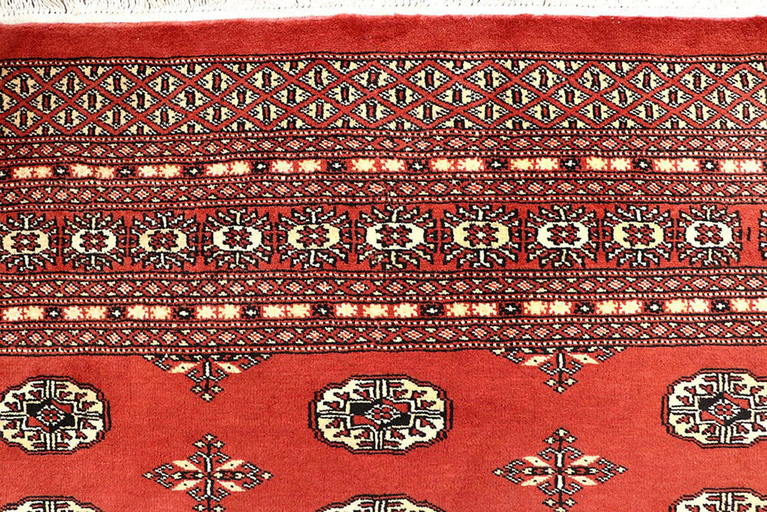 Coral Pakistani Bokhara Rug 6' 2" x 8' 10" Hand-Knotted | No. QA66791