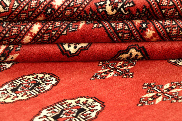 Coral Pakistani Bokhara Rug 6' 2" x 8' 10" Hand-Knotted | No. QA66791