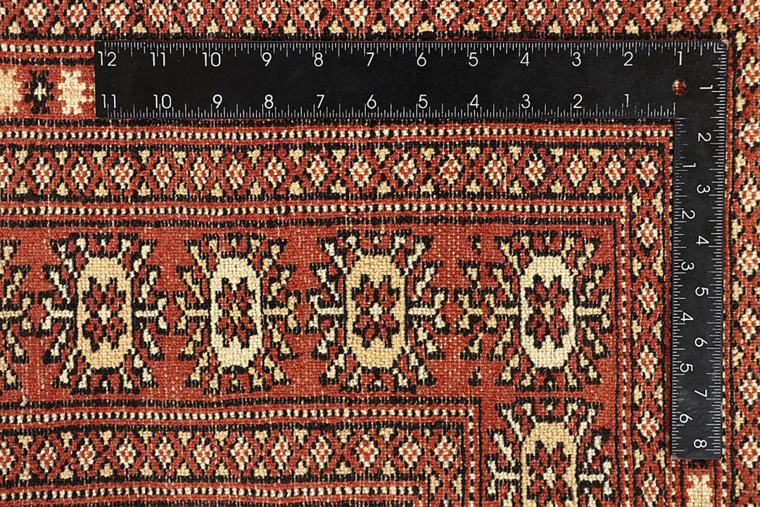 Coral Pakistani Bokhara Rug 6' 2" x 8' 10" Hand-Knotted | No. QA66791