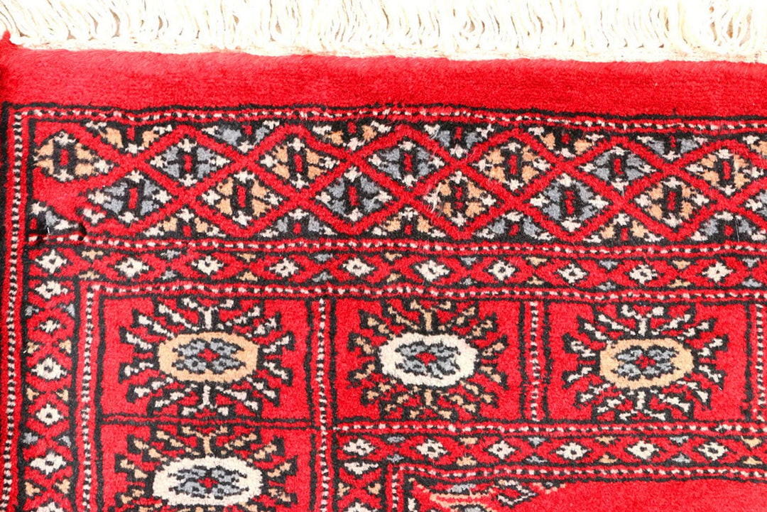 Dark Red Pakistani Bokhara Rug 2' 8" x 5' 5" Hand-Knotted | No. QA67290