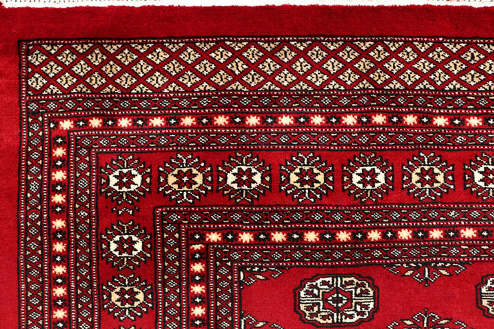 Red Pakistani Bokhara Rug 8' 1" x 10' 4" Hand-Knotted | No. QA67977