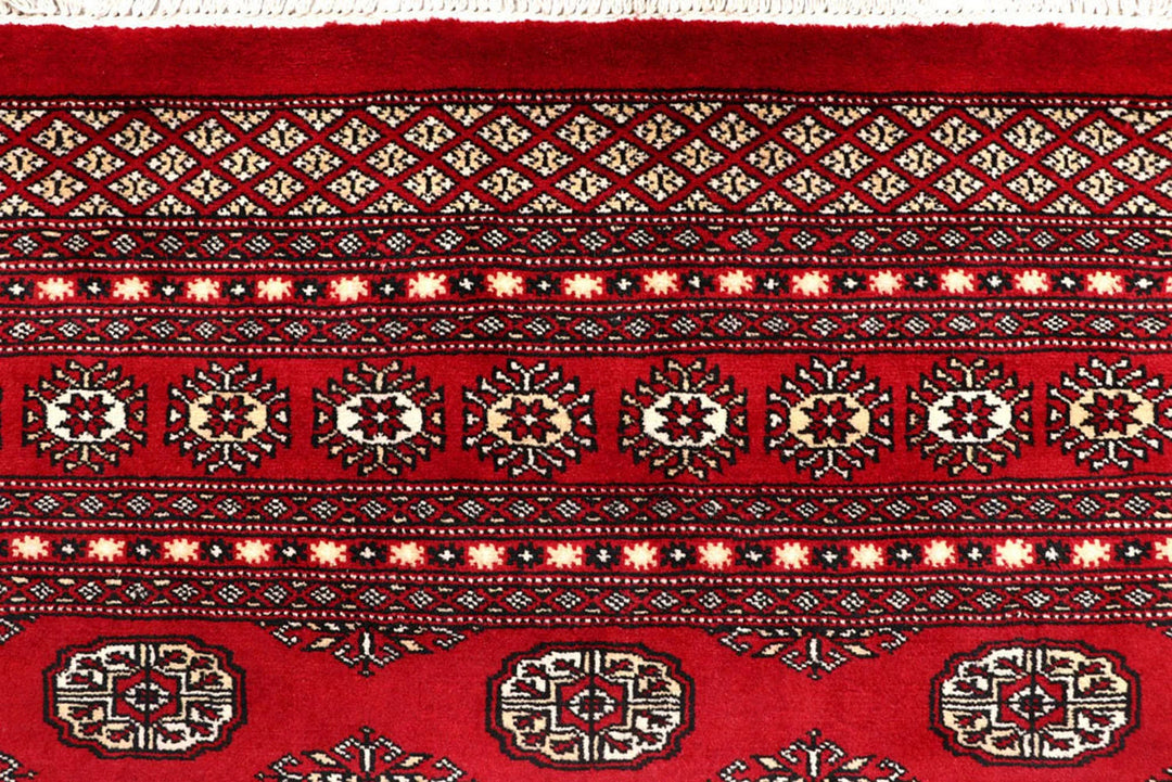 Red Pakistani Bokhara Rug 8' 1" x 10' 4" Hand-Knotted | No. QA67977