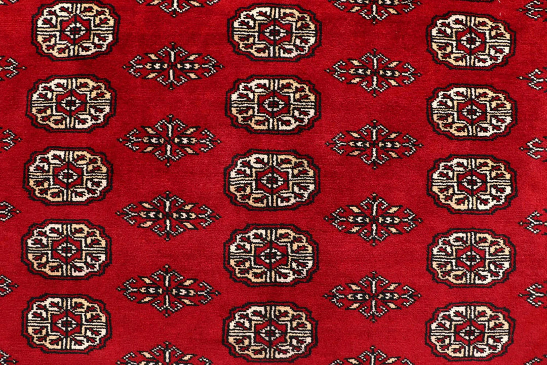 Red Pakistani Bokhara Rug 8' 1" x 10' 4" Hand-Knotted | No. QA67977