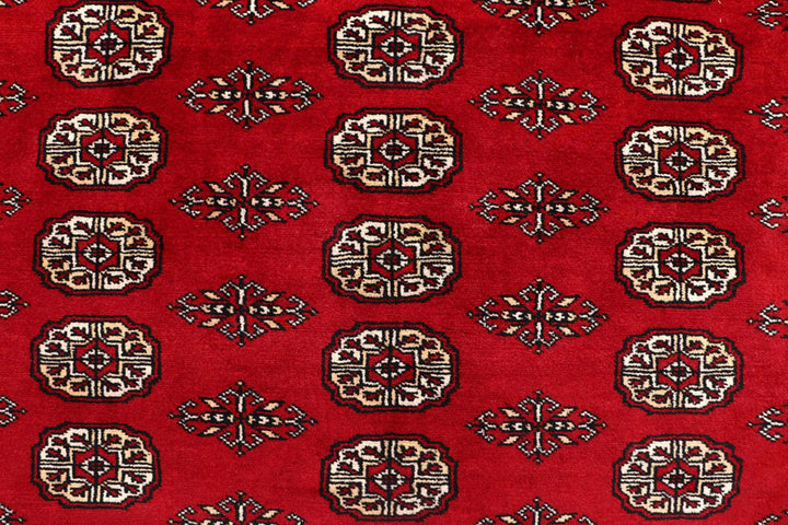 Red Pakistani Bokhara Rug 8' 1" x 10' 4" Hand-Knotted | No. QA67977