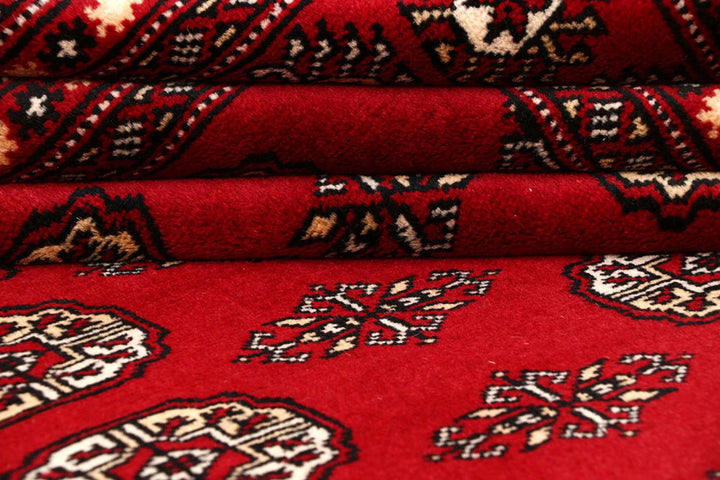 Red Pakistani Bokhara Rug 8' 1" x 10' 4" Hand-Knotted | No. QA67977