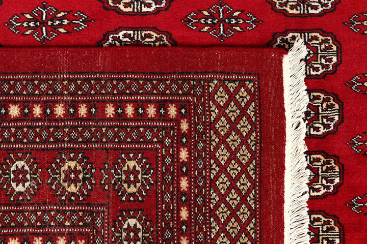 Red Pakistani Bokhara Rug 8' 1" x 10' 4" Hand-Knotted | No. QA67977