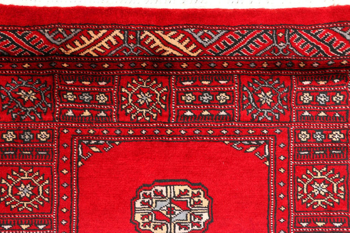 Dark Red Pakistani Bokhara Rug 2' 7" x 9' 2" Hand-Knotted | No. QA67992
