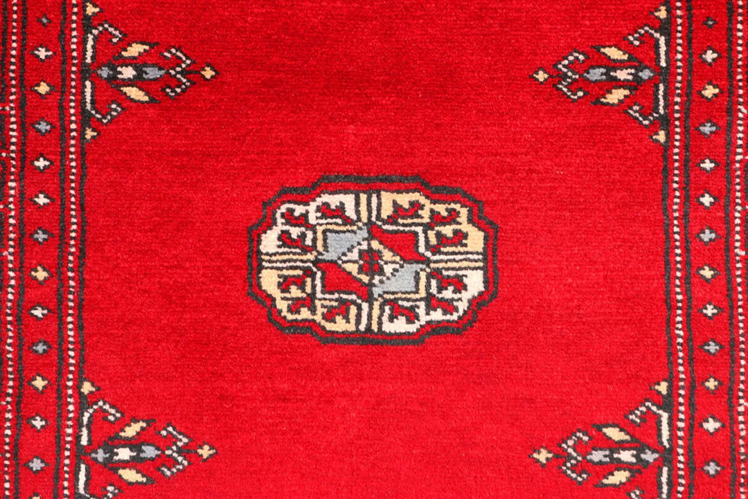 Dark Red Pakistani Bokhara Rug 2' 7" x 9' 2" Hand-Knotted | No. QA67992