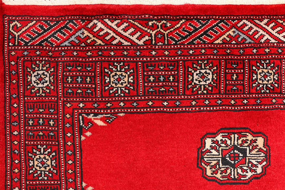 Red Pakistani Bokhara Rug 3' 1" x 5' 7" Hand-Knotted | No. QA68637