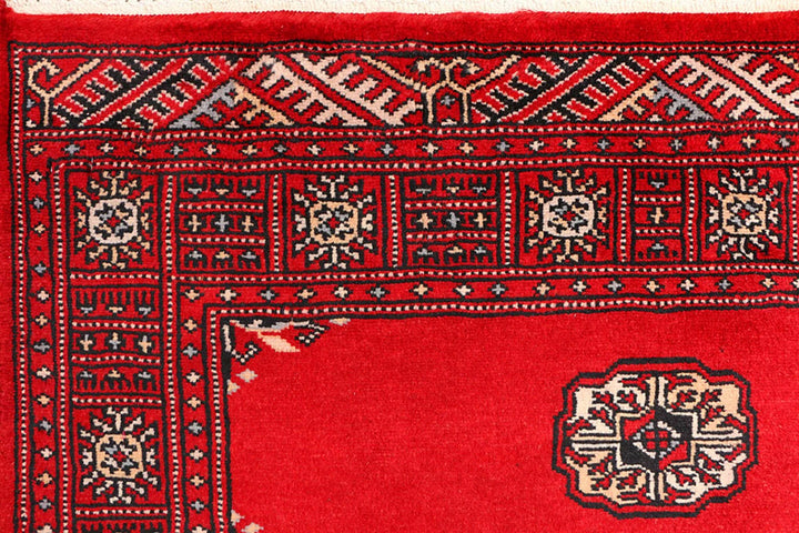Red Pakistani Bokhara Rug 3' 1" x 5' 7" Hand-Knotted | No. QA68637