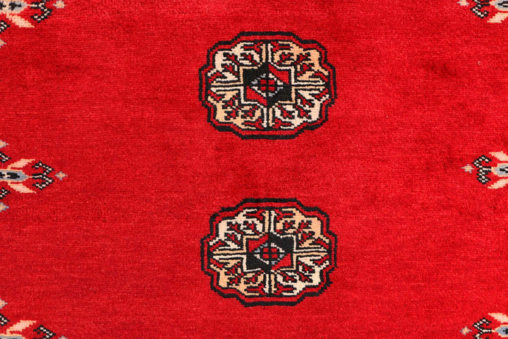 Red Pakistani Bokhara Rug 3' 1" x 5' 7" Hand-Knotted | No. QA68637