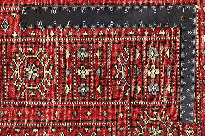 Firebrick Pakistani Bokhara Rug 5' 5" x 8' 11" Hand-Knotted | No. QA68866
