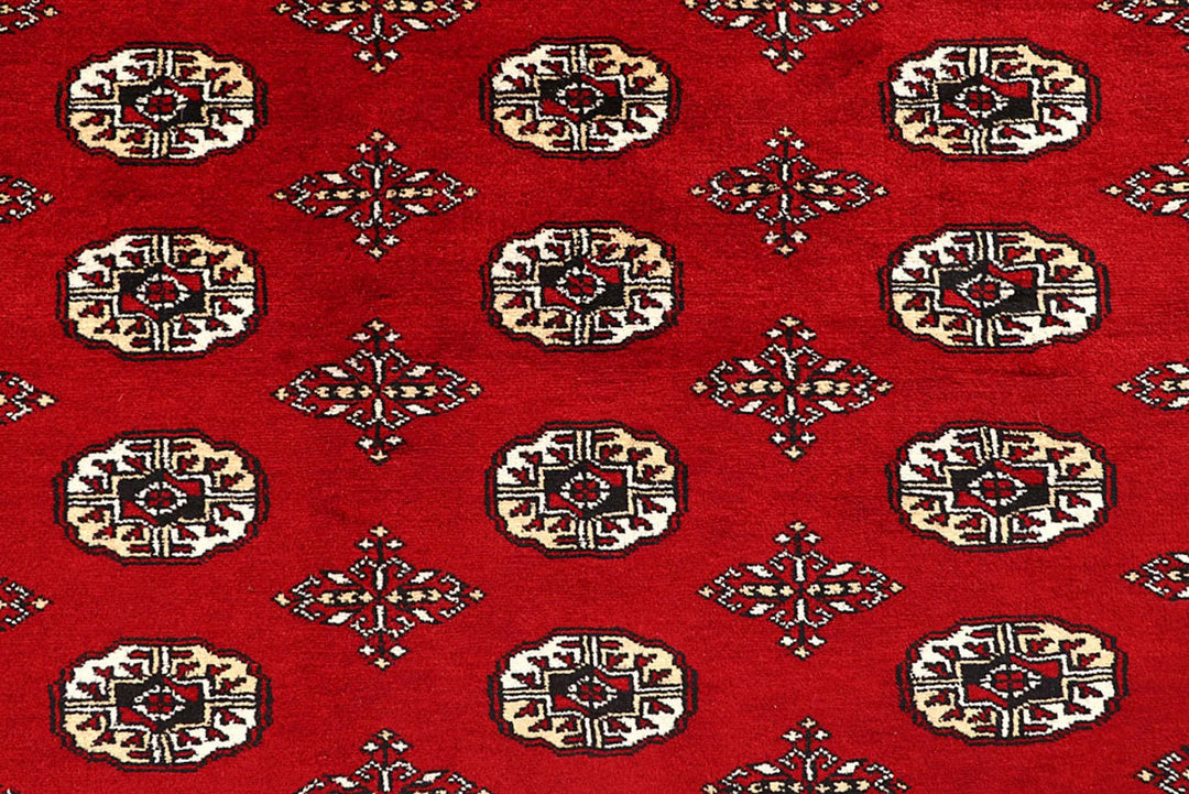 Red Pakistani Bokhara Rug 9' x 11' 11" Hand-Knotted | No. QA69062
