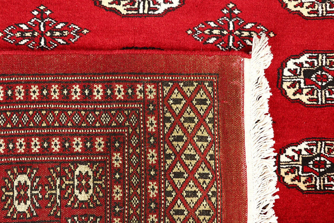 Red Pakistani Bokhara Rug 9' x 11' 11" Hand-Knotted | No. QA69062