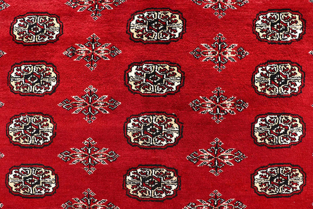 Red Pakistani Bokhara Rug 8' x 9'8" Hand-Knotted | No. QA69230
