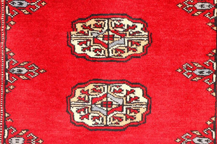 Red Pakistani Bokhara Rug 2' 6" x 6' 3" Hand-Knotted | No. QA69479