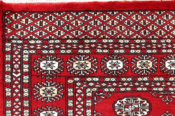 Red Pakistani Bokhara Rug 5' 2" x 7' 3" Hand-Knotted | No. QA69612