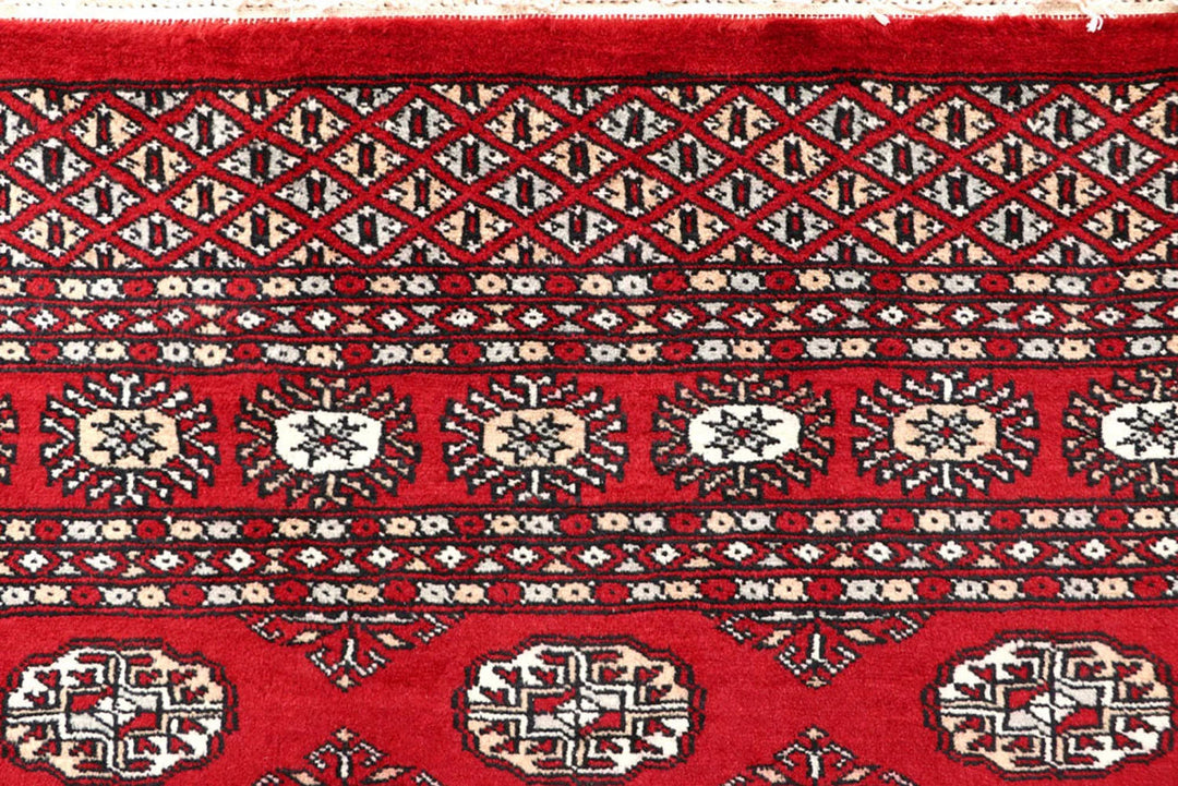 Red Pakistani Bokhara Rug 5' 2" x 7' 3" Hand-Knotted | No. QA69612