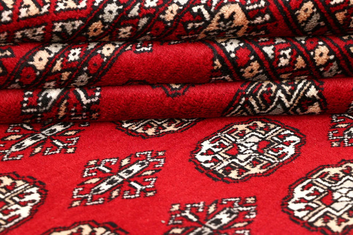 Red Pakistani Bokhara Rug 5' 2" x 7' 3" Hand-Knotted | No. QA69612