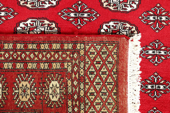 Red Pakistani Bokhara Rug 5' 2" x 7' 3" Hand-Knotted | No. QA69612