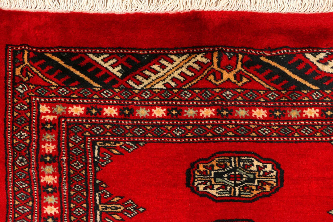 Red Pakistani Bokhara Rug 2' 7" x 9' 2" Hand-Knotted | No. QA70426
