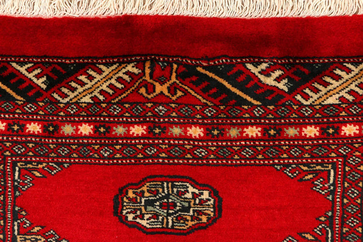 Red Pakistani Bokhara Rug 2' 7" x 9' 2" Hand-Knotted | No. QA70426