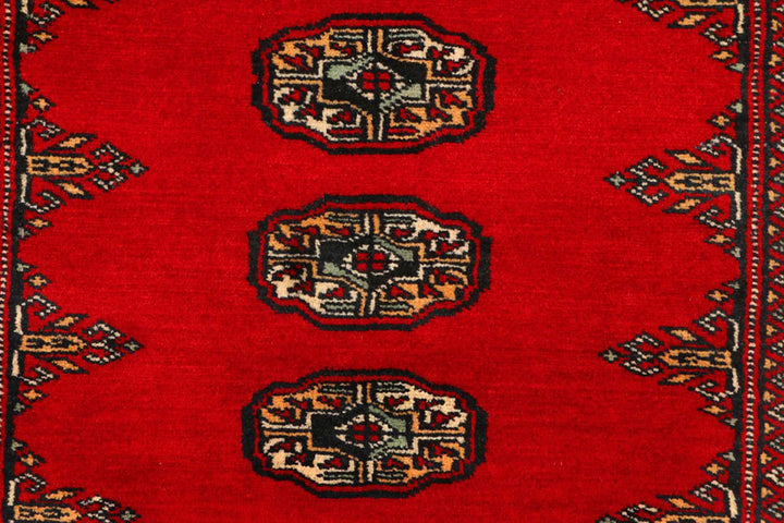 Red Pakistani Bokhara Rug 2' 7" x 9' 2" Hand-Knotted | No. QA70426