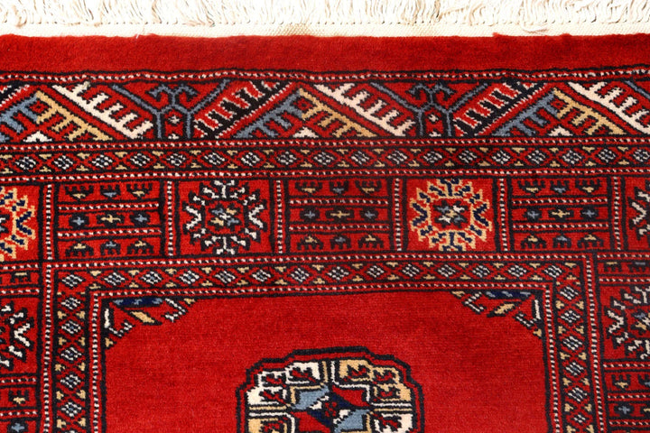 Red Pakistani Bokhara Rug 2' 7" x 10' Hand-Knotted | No. QA71275