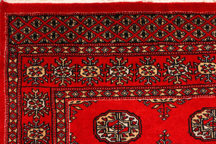 Red Pakistani Bokhara Rug 3' 1" x 5' 3" Hand-Knotted | No. QA71606