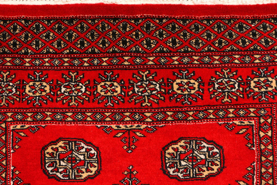 Red Pakistani Bokhara Rug 3' 1" x 5' 3" Hand-Knotted | No. QA71606