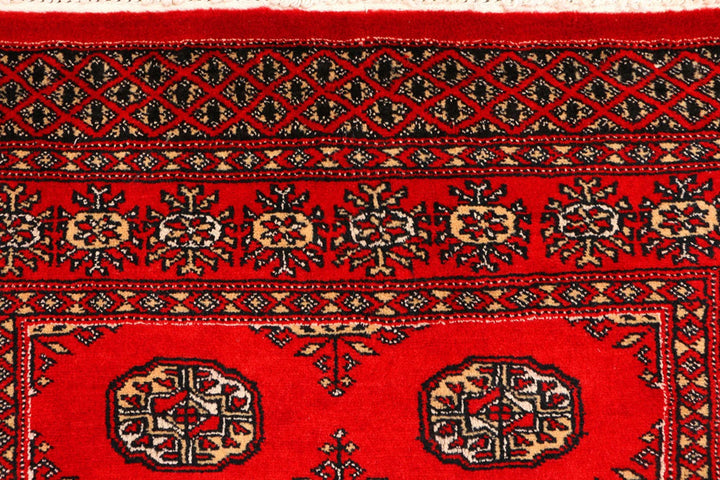 Red Pakistani Bokhara Rug 3' 1" x 5' 3" Hand-Knotted | No. QA71606