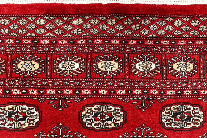 Red Pakistani Bokhara Rug 5' 10" x 8' 6" Hand-Knotted | No. QA72059