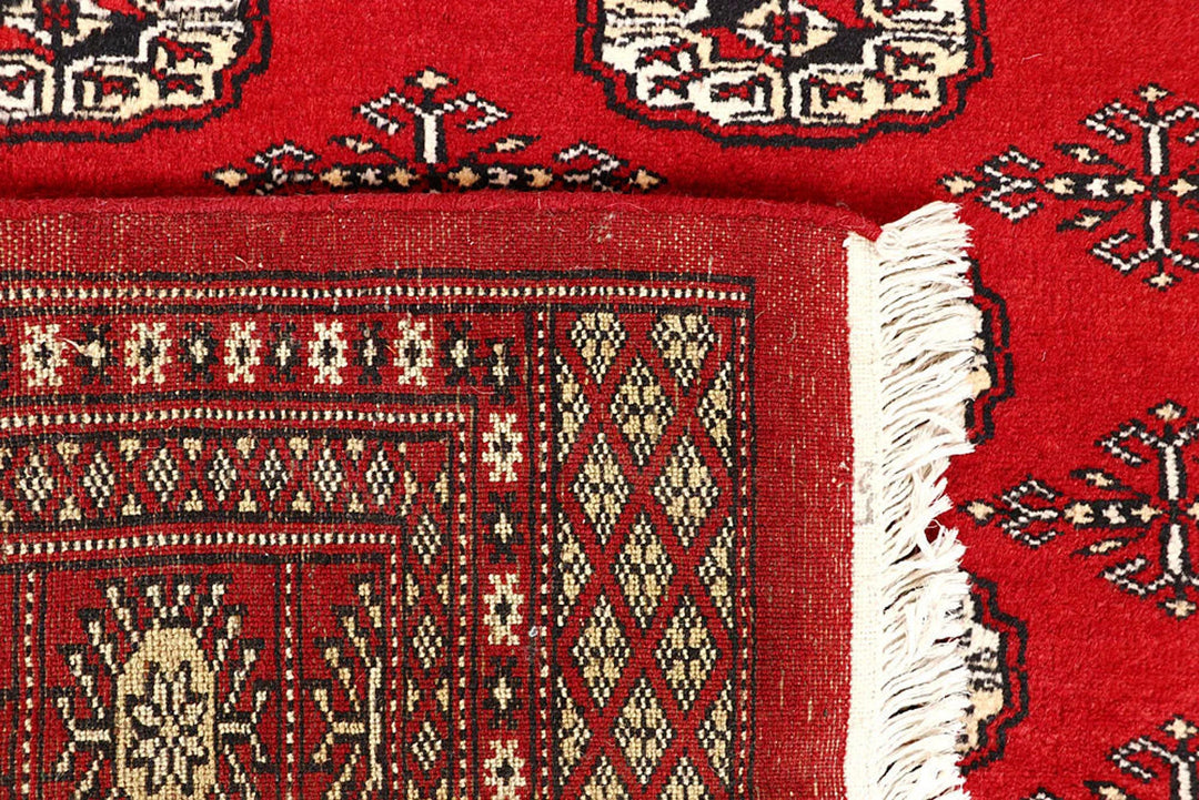 Red Pakistani Bokhara Rug 5' 10" x 8' 6" Hand-Knotted | No. QA72059