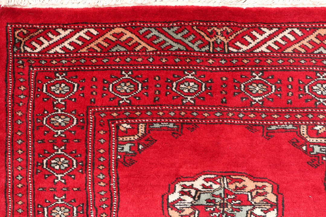 Dark Red Pakistani Bokhara Rug 2' 7" x 10' 6" Hand-Knotted | No. QA72719