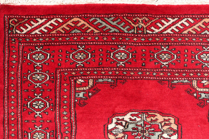 Dark Red Pakistani Bokhara Rug 2' 7" x 10' 6" Hand-Knotted | No. QA72719