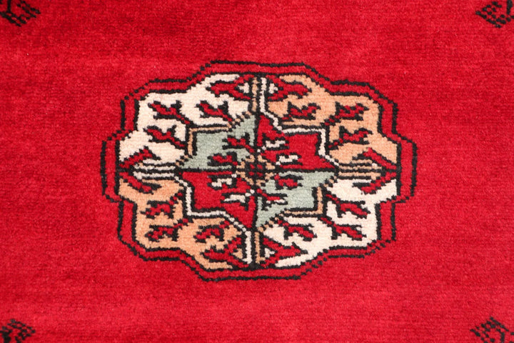 Dark Red Pakistani Bokhara Rug 2' 7" x 10' 6" Hand-Knotted | No. QA72719