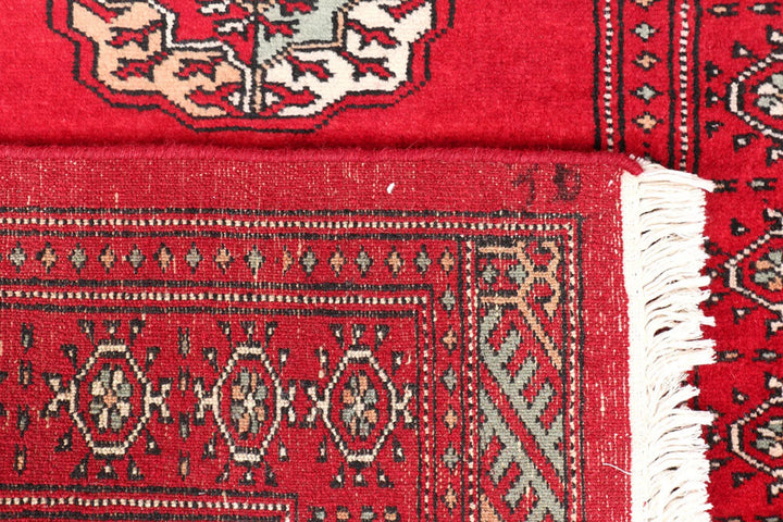 Dark Red Pakistani Bokhara Rug 2' 7" x 10' 6" Hand-Knotted | No. QA72719