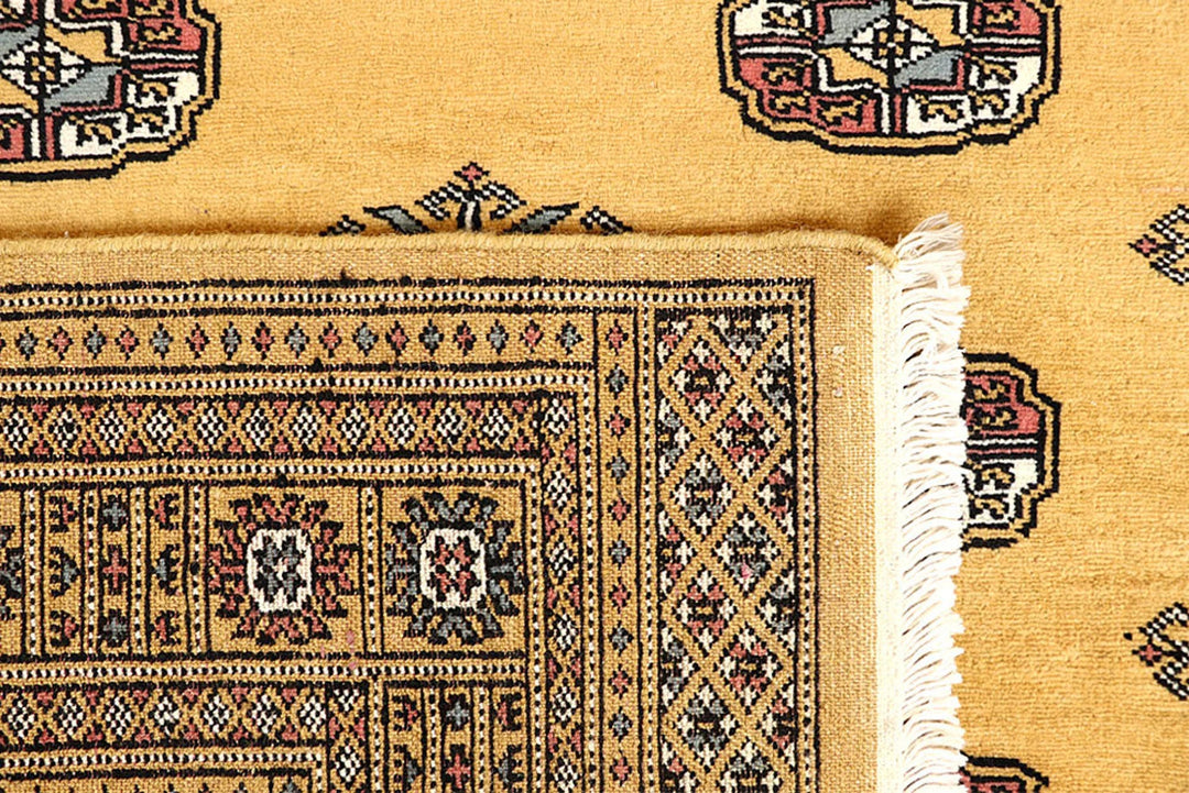 Gold Bokhara Rug 4' 2" x 6' 3" Hand-Knotted | No. QA72983