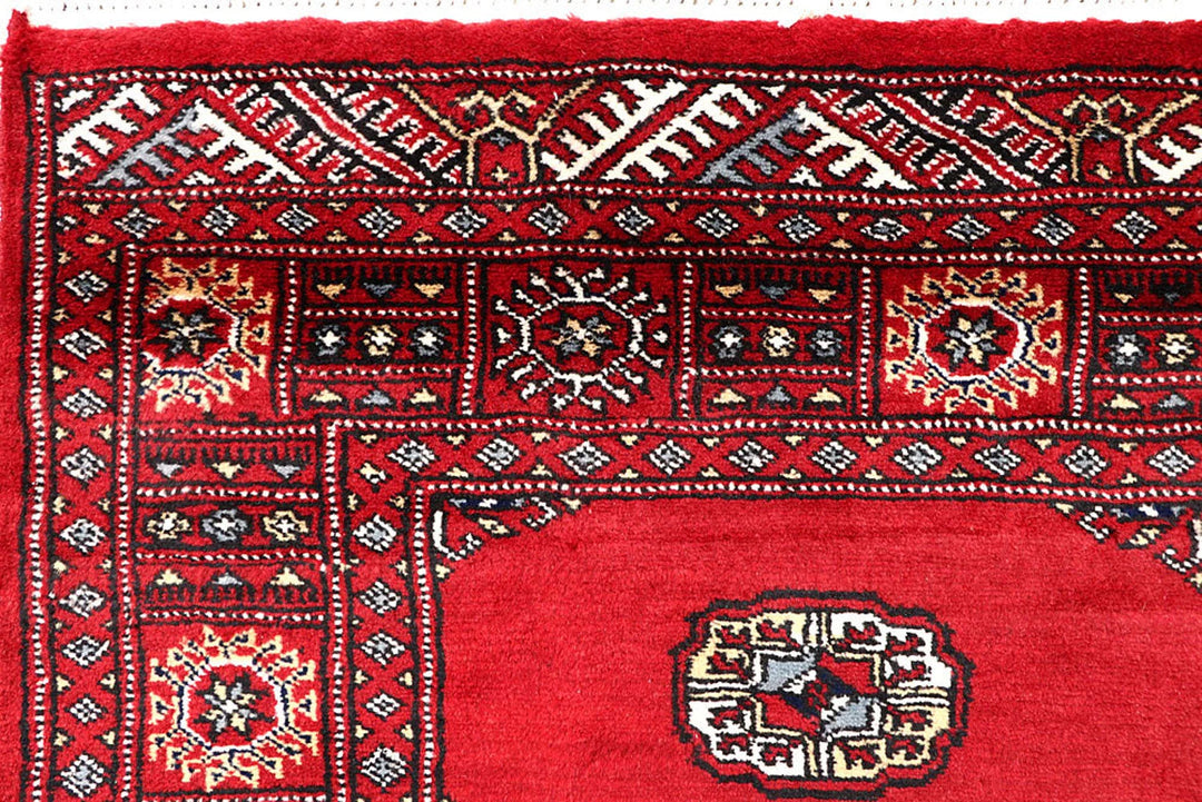 Red Pakistani Bokhara Rug 4' 2" x 6' 9" Hand-Knotted | No. QA73256