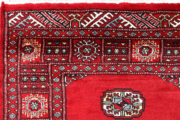 Red Pakistani Bokhara Rug 4' 2" x 6' 9" Hand-Knotted | No. QA73256
