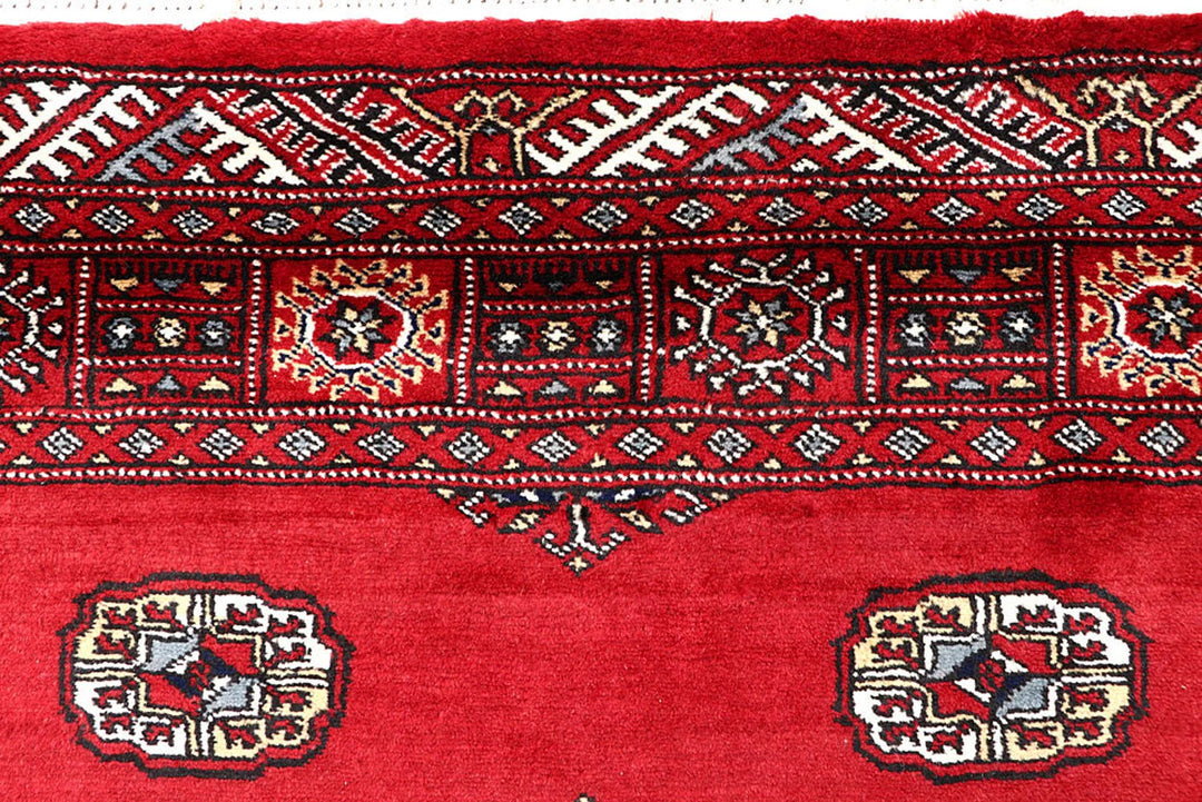 Red Pakistani Bokhara Rug 4' 2" x 6' 9" Hand-Knotted | No. QA73256