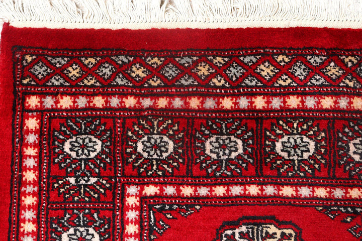 Red Pakistani Bokhara Rug 2' 6" x 9' 4" Hand-Knotted | No. QA73641